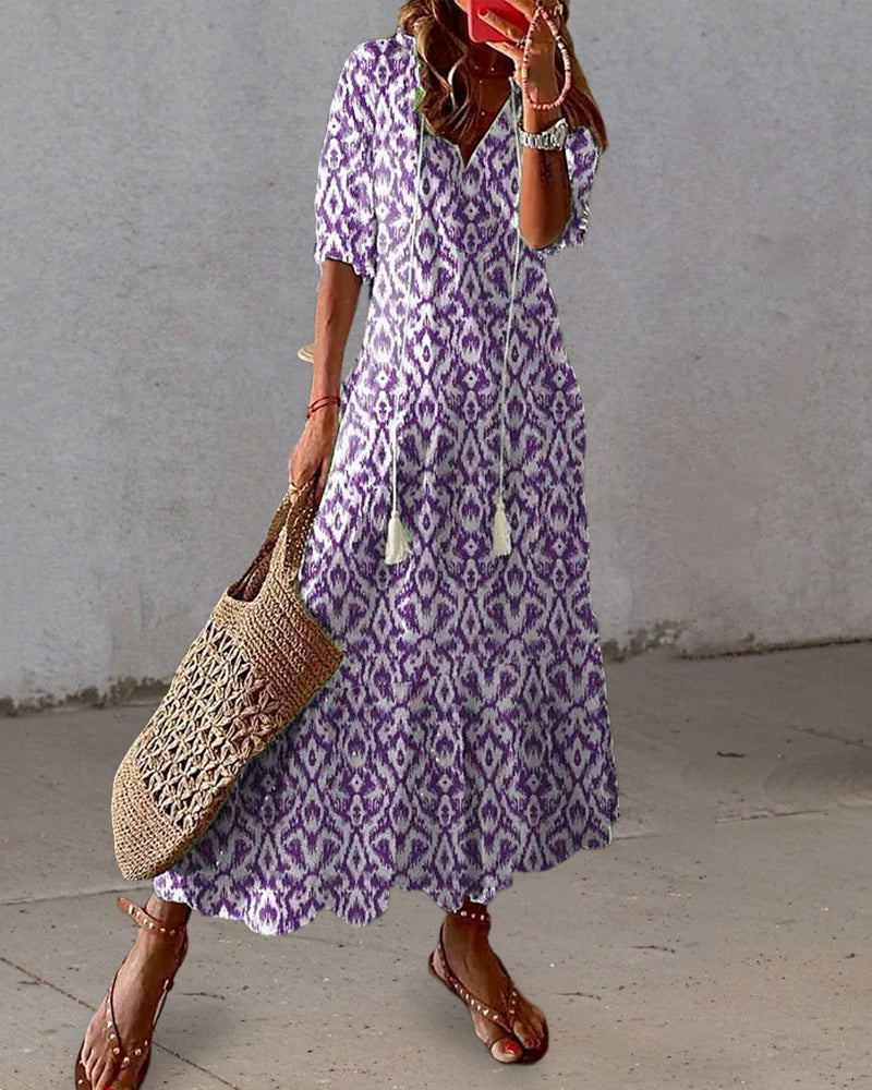 Robe maxi femme bohème chic, style Ibiza élégant. Vêtement d'été fluide idéal pour la plage et les vacances.