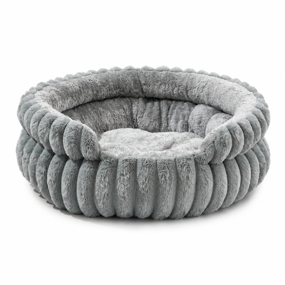 Lit rond douillet et rembourré pour chiens et chats, offrant un confort optimal à votre animal.
