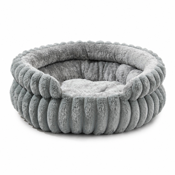 Lit rond douillet et rembourré pour chiens et chats, offrant un confort optimal à votre animal.