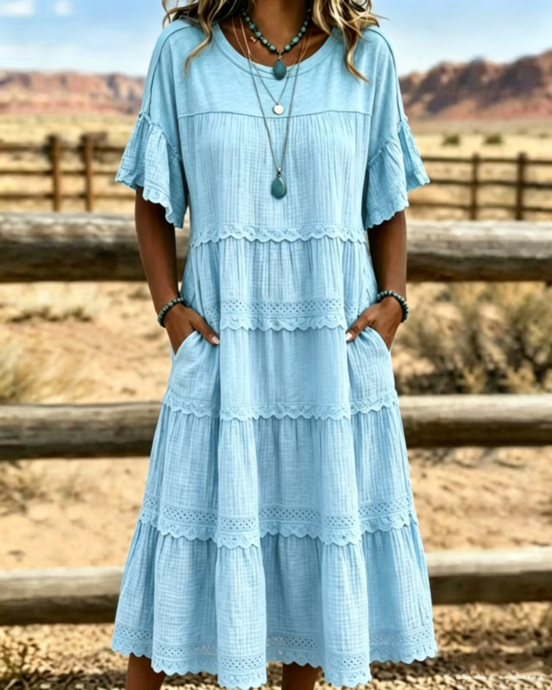 Robe midi femme fluide en coton et lin avec volants délicats, parfaite pour l'été ou le printemps.
