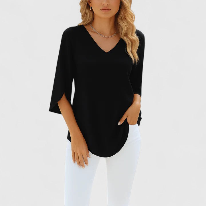 Blouse élégante et fluide pour femme, manches fendues, style sophistiqué, parfaite pour bureau ou décontracté.