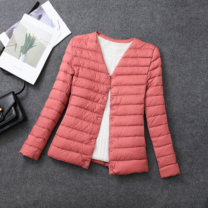 Veste femme isolante douce, col rond. Confort et chaleur pour superposition automne et hiver.