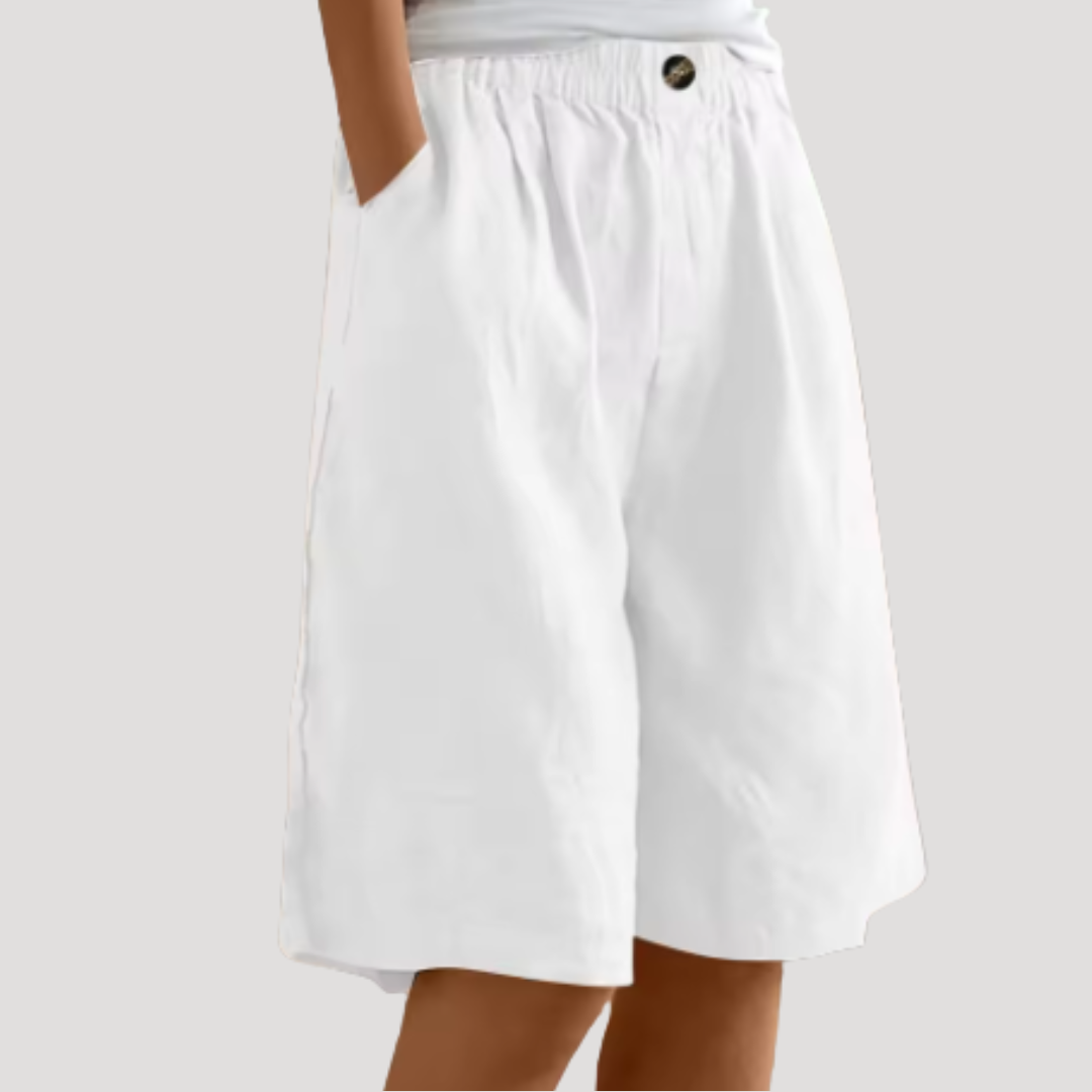 Bermuda femme tendance, coupe ample et taille élastique. Style chic et décontracté pour un été mode.