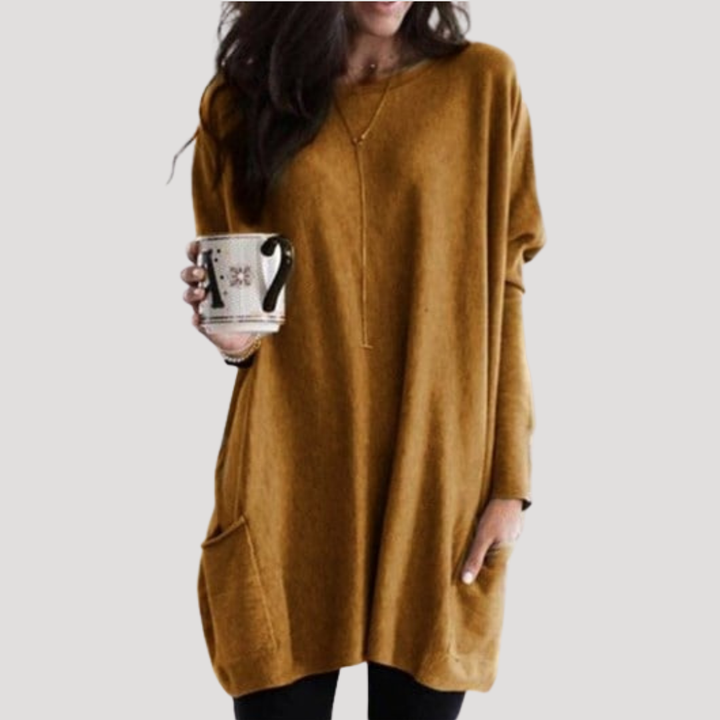 Restez au chaud avec ce pull long femme décontracté à motif géométrique, idéal pour vos tenues d'hiver.