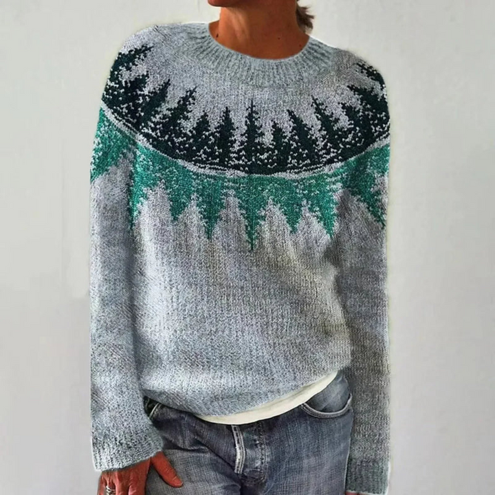 Vue du pull femme à motifs graphiques, col rond, manches longues. Vêtement décontracté chic, chaud et tendance.
