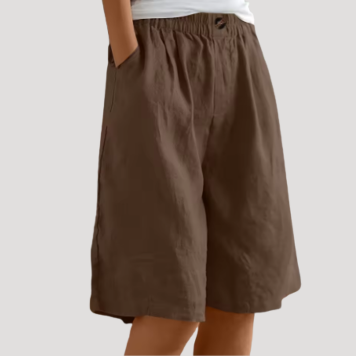 Bermuda femme élégant, taille élastique, coupe ample. Confortable et chic, parfait pour un été stylé.