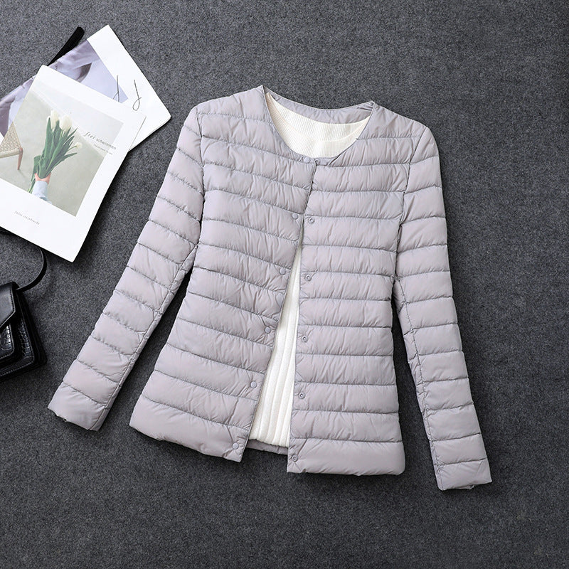 Veste femme isolante douce à col rond. Idéale pour superposition et chaleur élégante au quotidien.