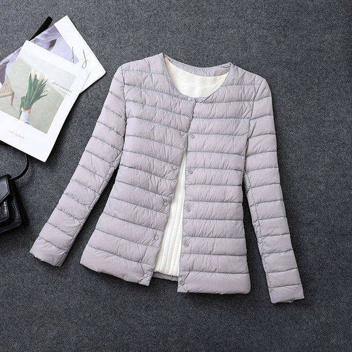 Veste femme isolante douce à col rond. Idéale pour superposition et chaleur élégante au quotidien.