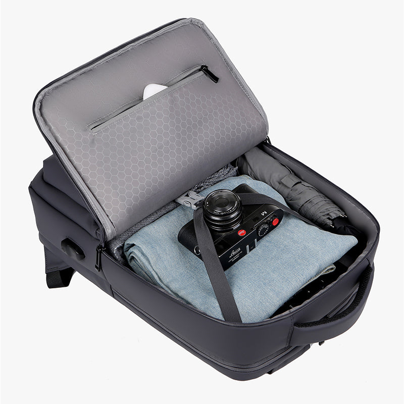 Sac à dos professionnel gris anthracite, étanche et sécurisé pour ordinateur portable et documents, unisexe.