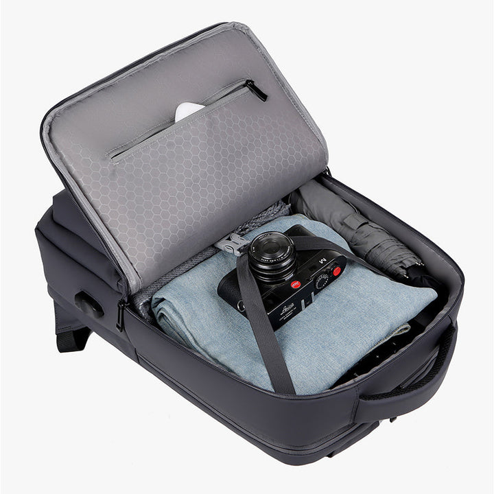 Sac à dos professionnel gris anthracite, étanche et sécurisé pour ordinateur portable et documents, unisexe.