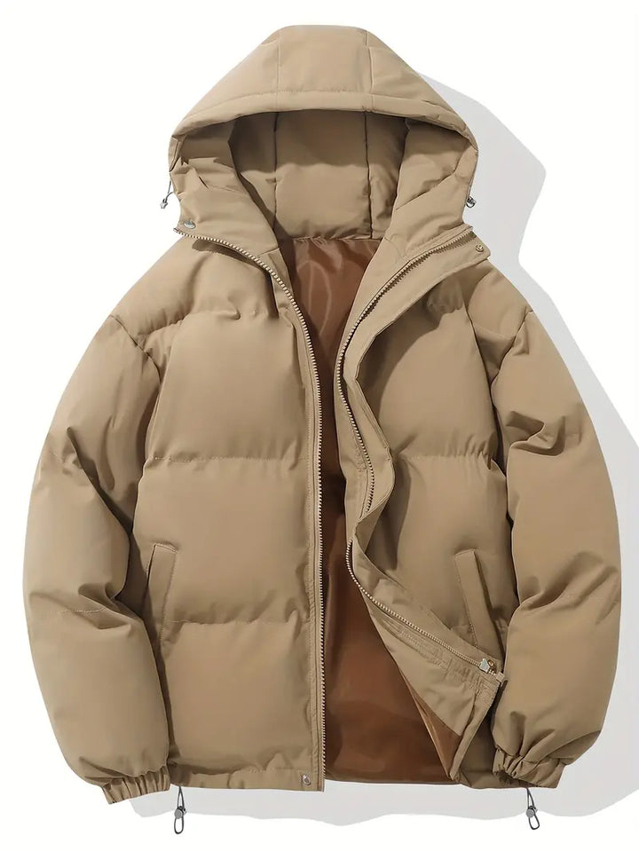 Veste homme élégante avec rembourrage matelassé et capuche, parfaite pour le style et la chaleur hivernale.