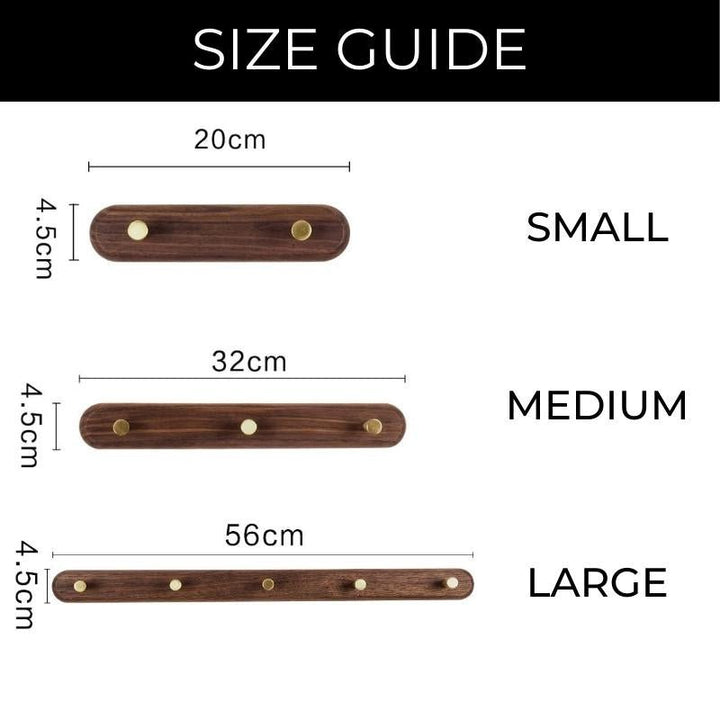 Porte-manteau élégant minimaliste, base en bois foncé et crochets en laiton pour votre hall.