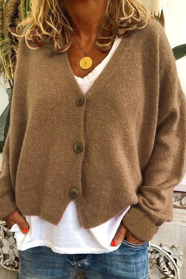 Cardigan femme élégant en tricot, style décontracté pour automne/hiver. Confort et mode.