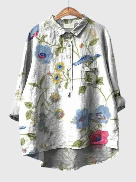 Mode femme: blouse fleurie chic et polyvalente, pour un style décontracté ou habillé.