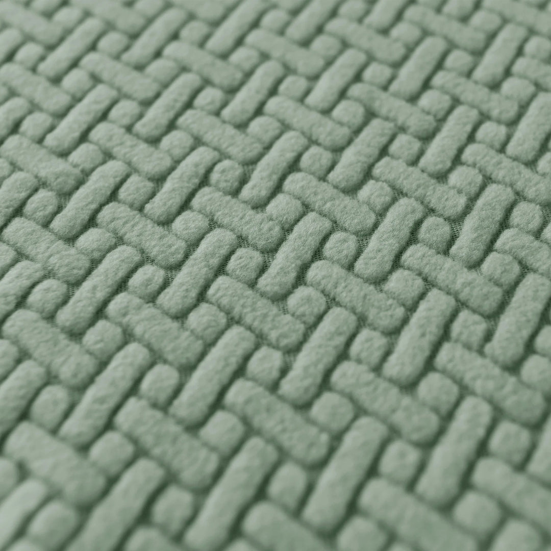 Housse de canapé jacquard extensible grise. Ameublement moderne, parfaite pour la protection du salon.