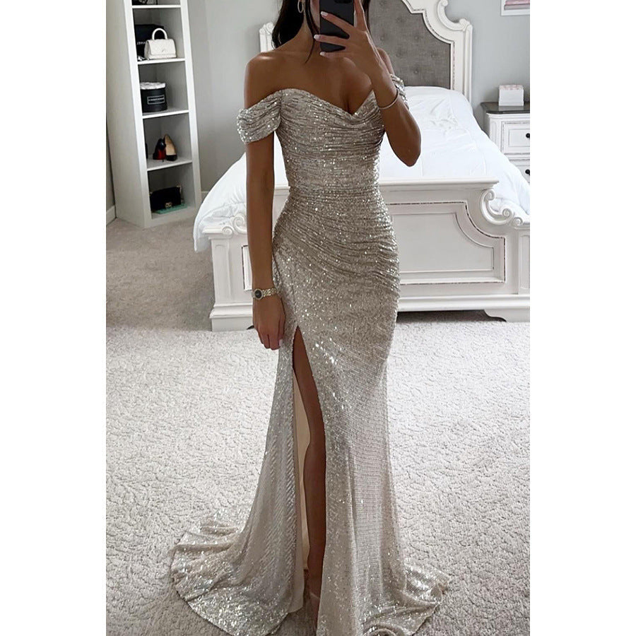Robe de fête femme, longue et brillante. Fendue et épaules dénudées. Idéale pour un look élégant et chic en soirée.