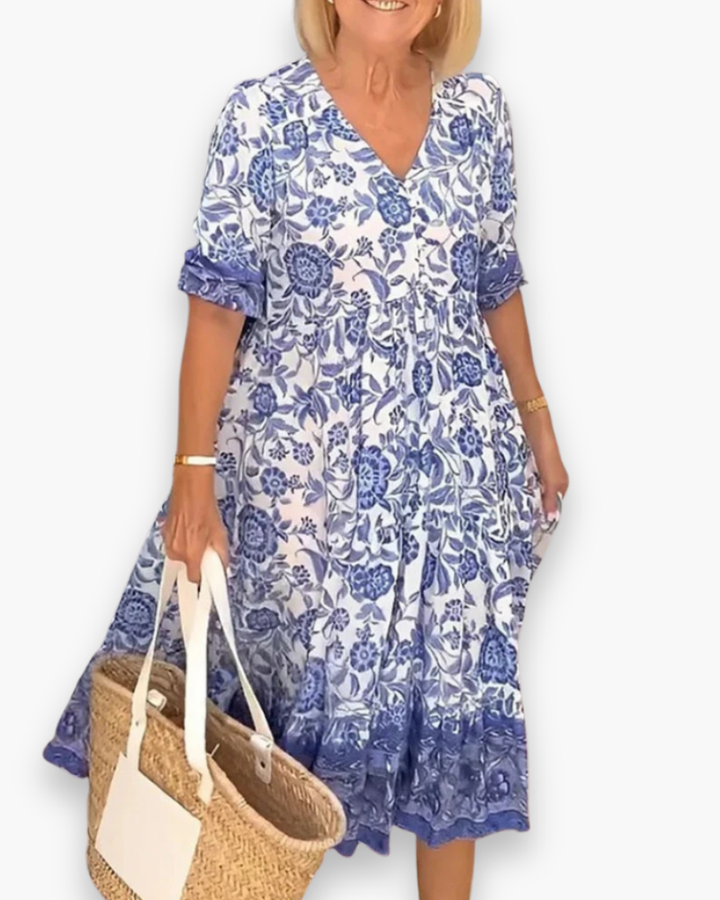 Robe fleurie midi femme, élégante et décontractée. Idéale pour un look printemps/été tendance.