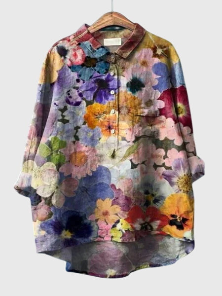 Blouse florale chic pour femme, design élégant et frais, tendance printemps-été.
