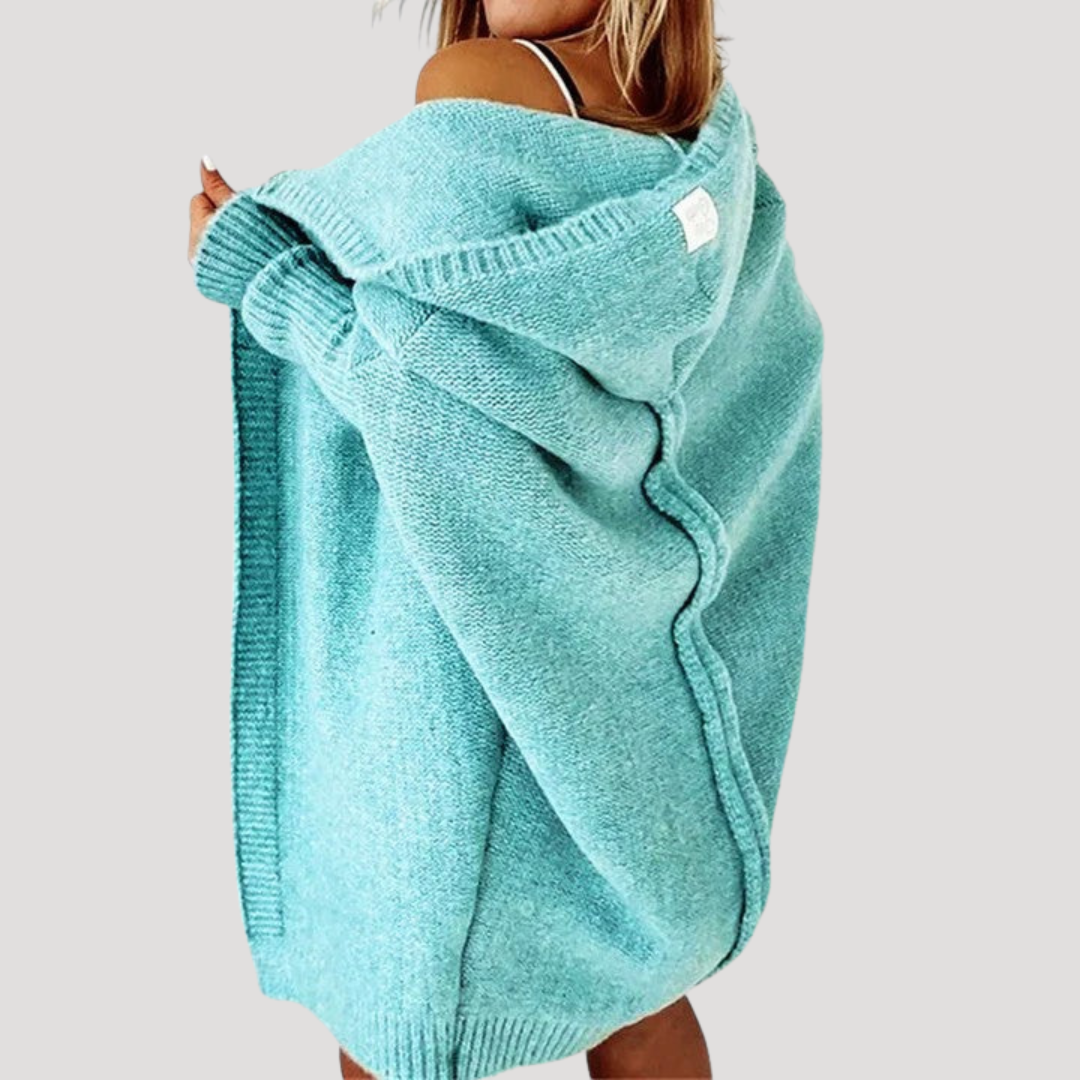 Gilet femme oversize à capuche, long et confortable, idéal pour l'automne-hiver.