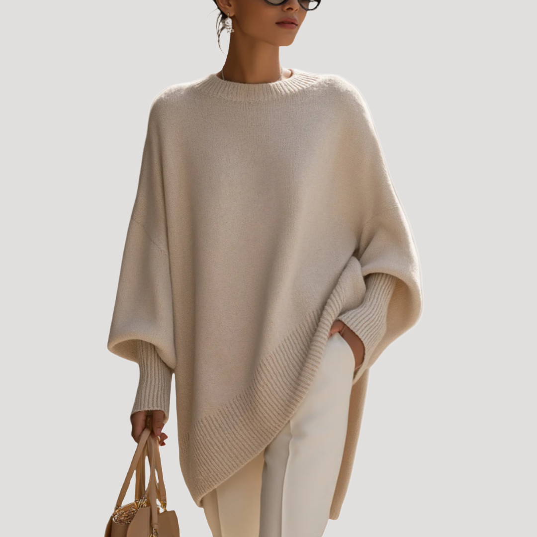 Pull poncho femme oversize gris, style décontracté et confortable pour un look quotidien tendance.