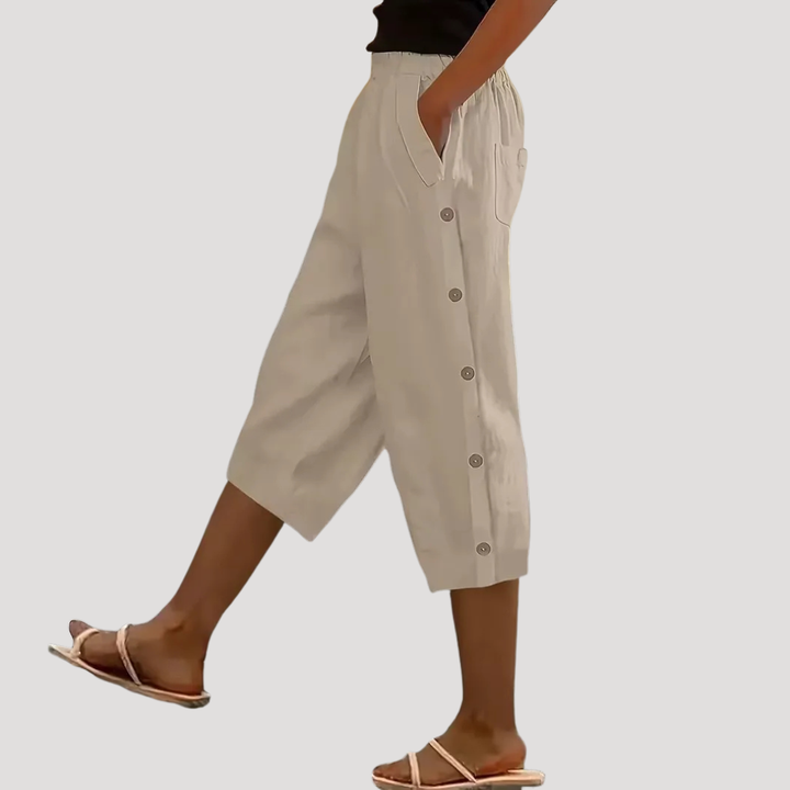 Pantalon fluide femme large mi-long, idéal pour l'été. Confortable, coupe ample et légère pour mode décontractée.