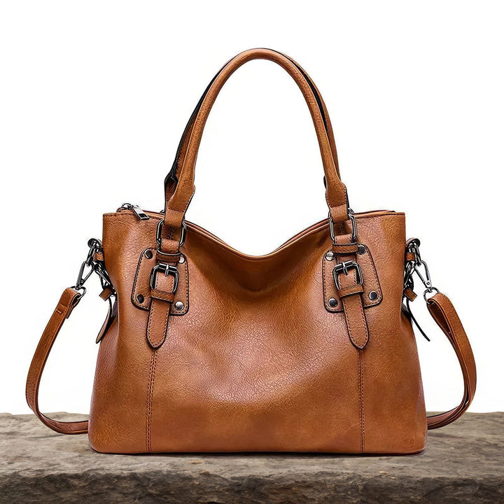 Sac bandoulière femme en cuir marron, design raffiné et élégant, parfait accessoire mode.