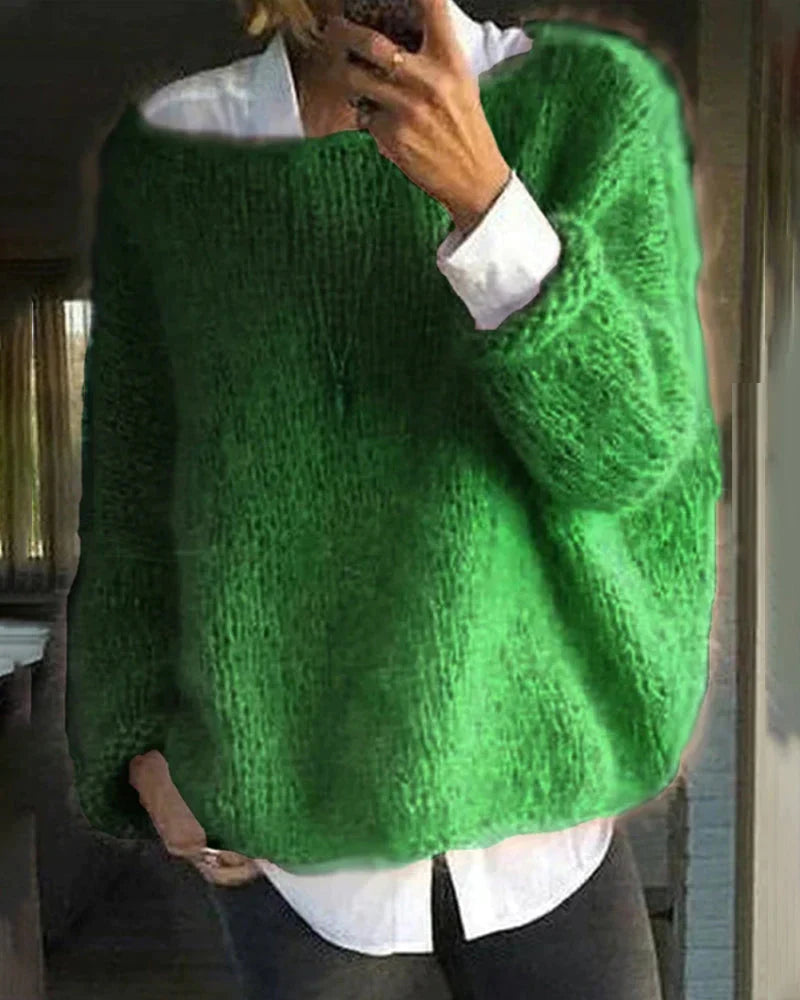 Pull femme Renate pour un confort supérieur et un style intemporel. Ce vêtement élégant à col rond est parfait pour l'hiver.