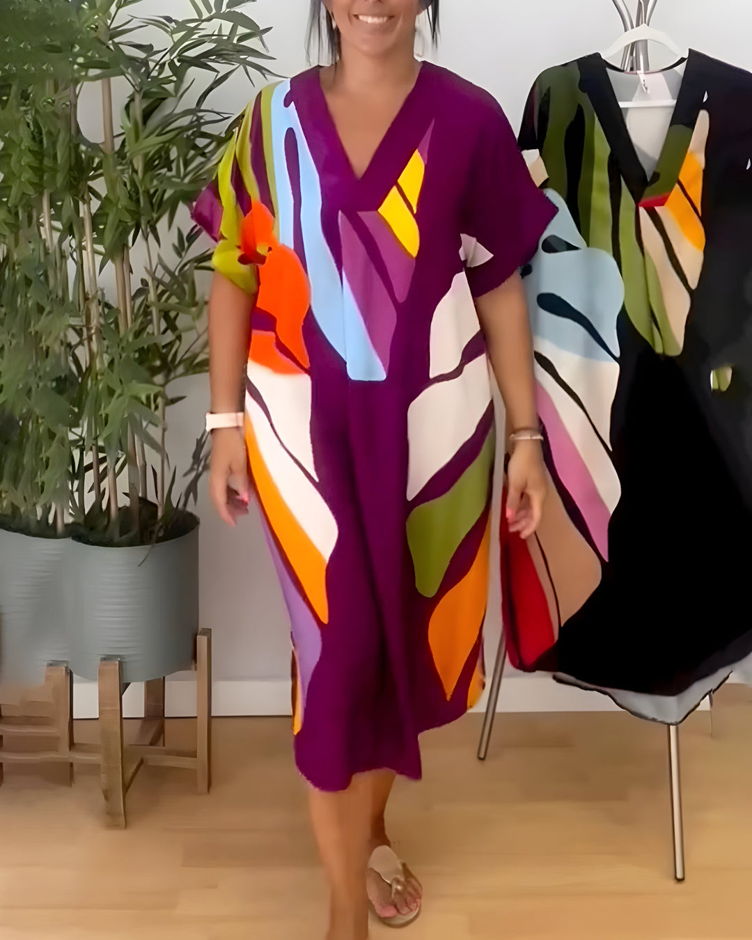 Robe femme décontractée imprimé feuillage, coupe ample confortable, col V. Idéale pour l'été.