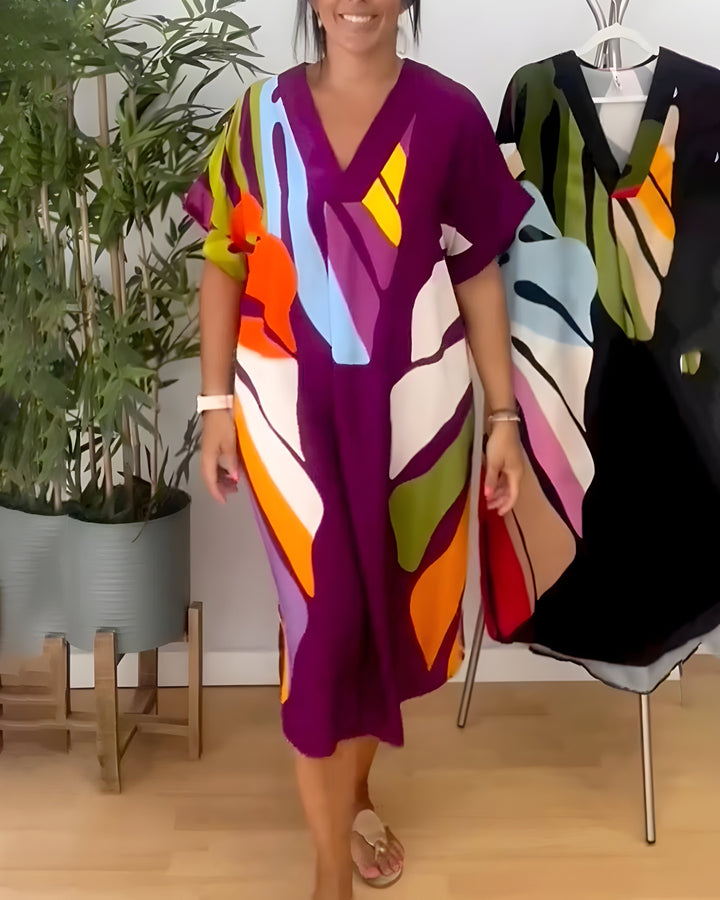 Robe femme décontractée imprimé feuillage, coupe ample confortable, col V. Idéale pour l'été.
