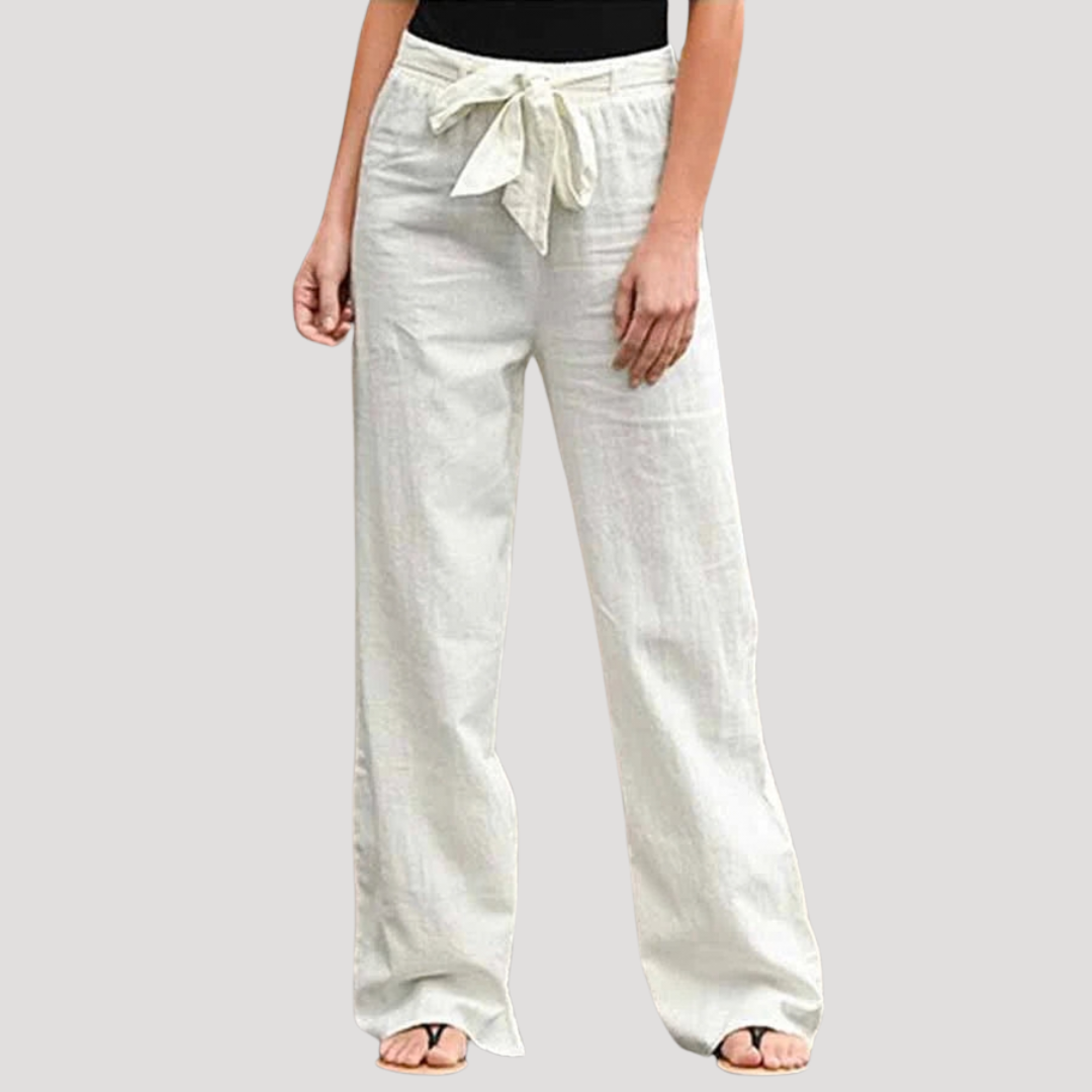 Pantalon femme léger en lin blanc, coupe droite. Idéal pour un look estival décontracté et confortable.