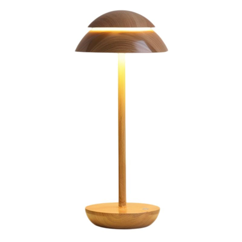 Lampe de table design moderne, rechargeable et sans fil, parfaite pour un éclairage d'ambiance intérieur.
