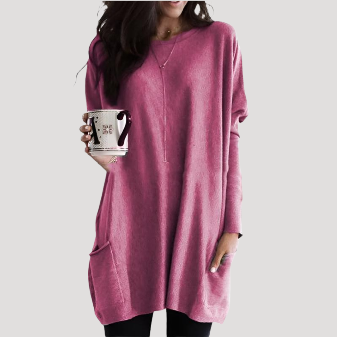 Pull long femme décontracté à motif géométrique, idéal pour un look automne-hiver confortable.
