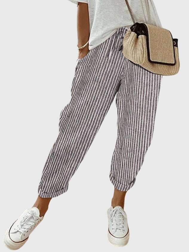Pantalon élégant décontracté pour femmes, coupe droite et matière fluide, très confortable.
