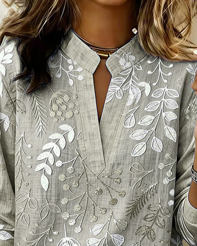 Haut floral fluide chic pour femme, col V, manches longues, parfait pour l'été et sorties.