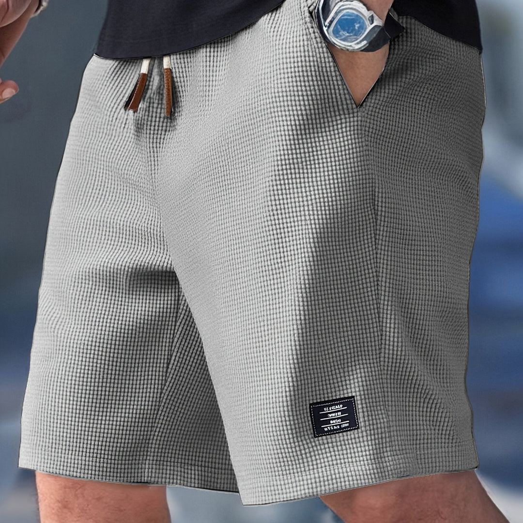 Short homme ample, décontracté et léger pour un confort estival supérieur. Parfait pour les vacances et détente.