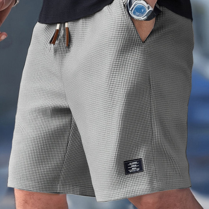 Short homme ample, décontracté et léger pour un confort estival supérieur. Parfait pour les vacances et détente.