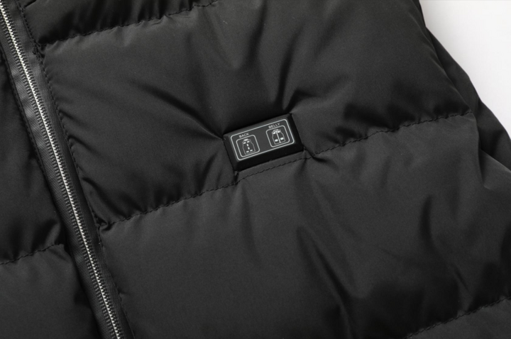 Veste chauffante VitalWarm unisexe, en nylon résistant, pour un confort thermique supérieur et polyvalent en hiver.