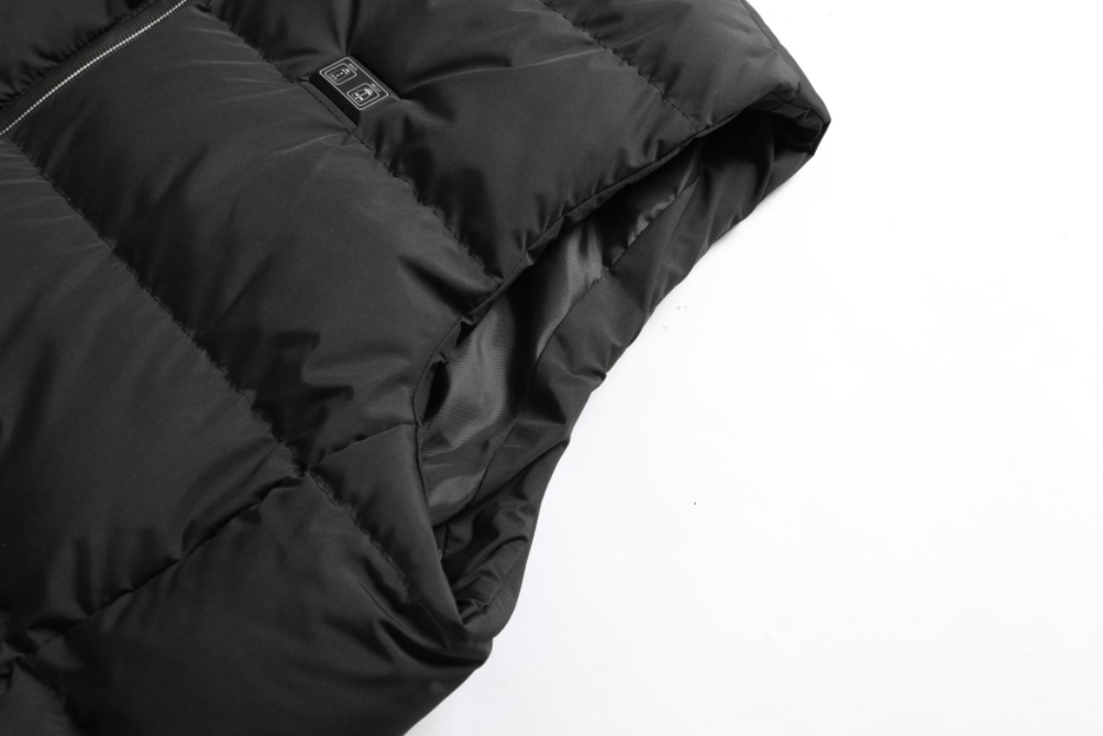 Style et chaleur avec la veste chauffante VitalWarm, indispensable pour l'hiver et les activités outdoor.