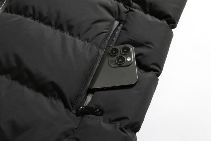 Affrontez le froid avec la veste chauffante unisexe VitalWarm, parfaite pour le travail extérieur et les loisirs.