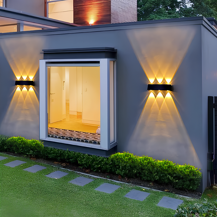Lampe murale solaire LED, design moderne, facile à installer pour un éclairage extérieur chaleureux et économique.