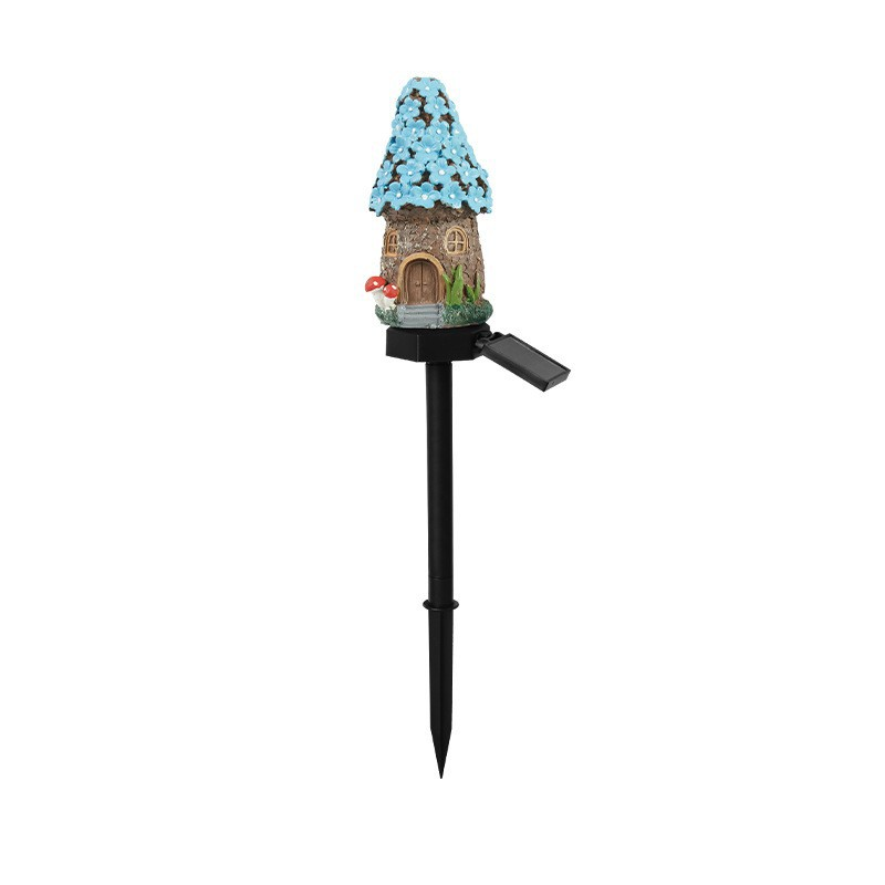 Lampe solaire champignon illuminée la nuit, crée une ambiance féerique dans le jardin avec sa lumière LED.