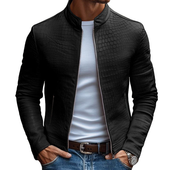 Gros plan sur la veste homme, motif pierre texturé. Coupe ajustée, parfaite pour une tenue automnale chic.