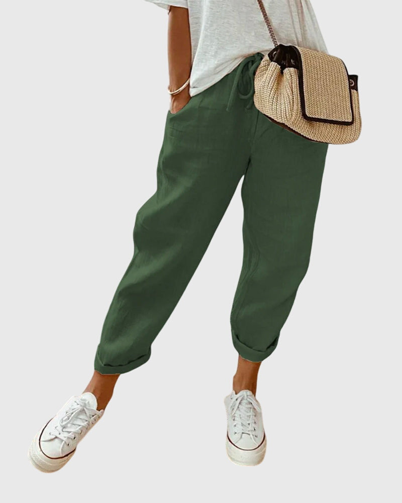 Mode femme : pantalon chic à taille haute, alliant confort et style sophistiqué pour l'été.