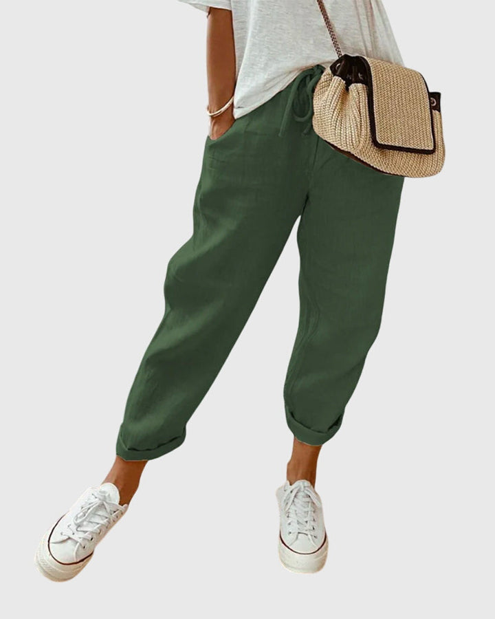 Mode femme : pantalon chic à taille haute, alliant confort et style sophistiqué pour l'été.