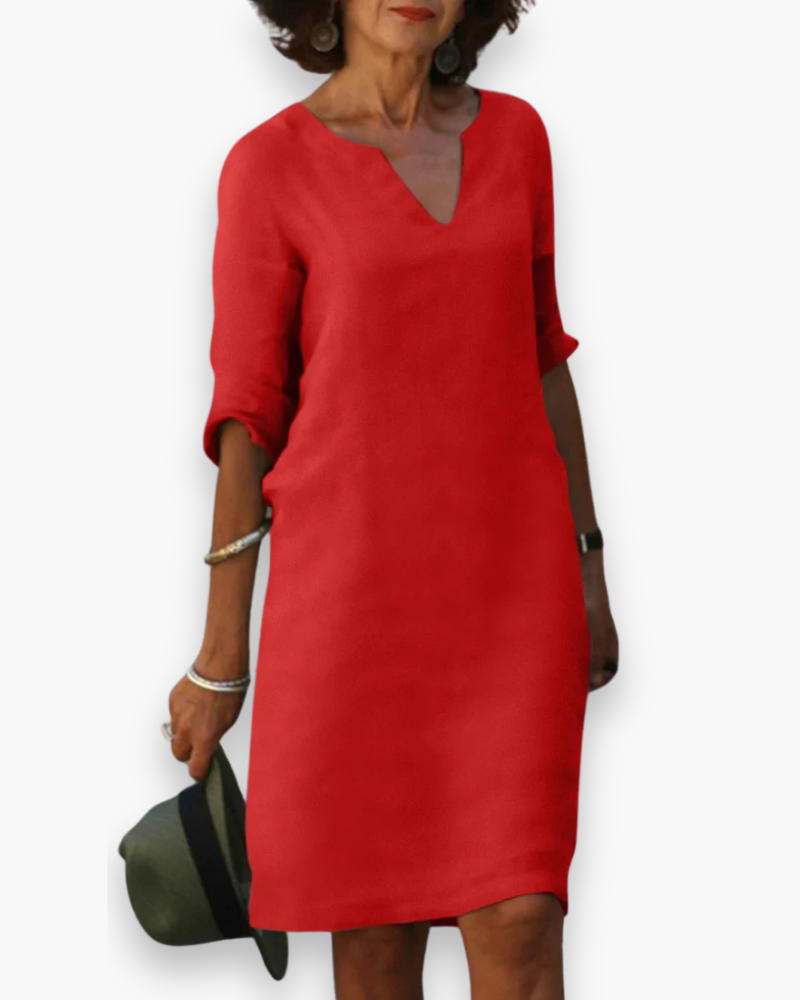 Robe femme moderne, col V, style intemporel. Parfaite pour un confort élégant au travail ou en sortie.