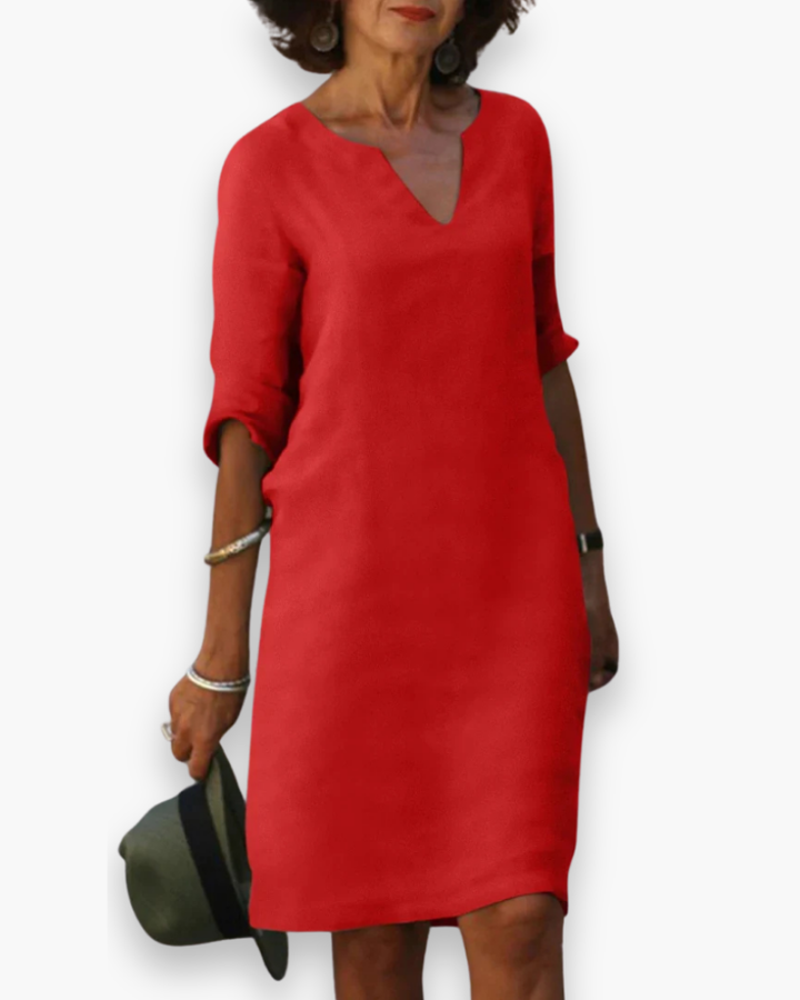 Robe femme moderne, col V, style intemporel. Parfaite pour un confort élégant au travail ou en sortie.