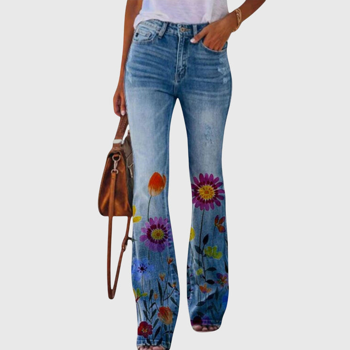 Pantalon évasé femme à imprimé floral coloré, élégant et confortable pour le printemps-été.