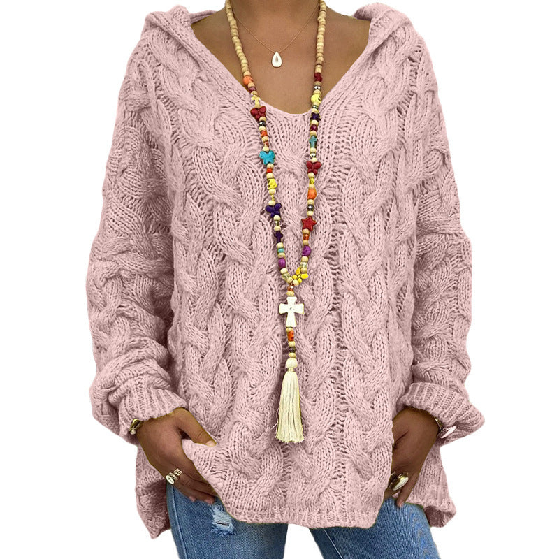 Gros plan pull torsadé femme en maille texturée. Chandail douillet et confortable à manches longues pour l'hiver.