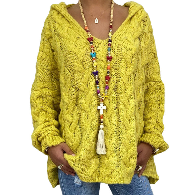 Pull femme élégant style bohème, maille torsadée. Parfait pour un look hivernal chic et décontracté.