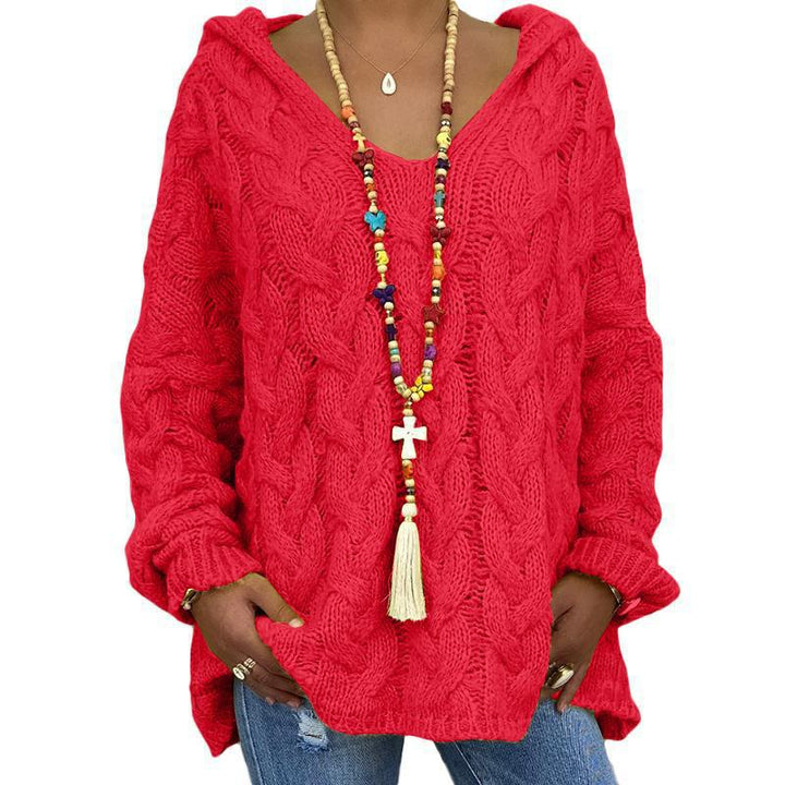 Vêtement femme hivernal très chaud, pull torsadé confortable. Idéal pour affronter le froid avec style.